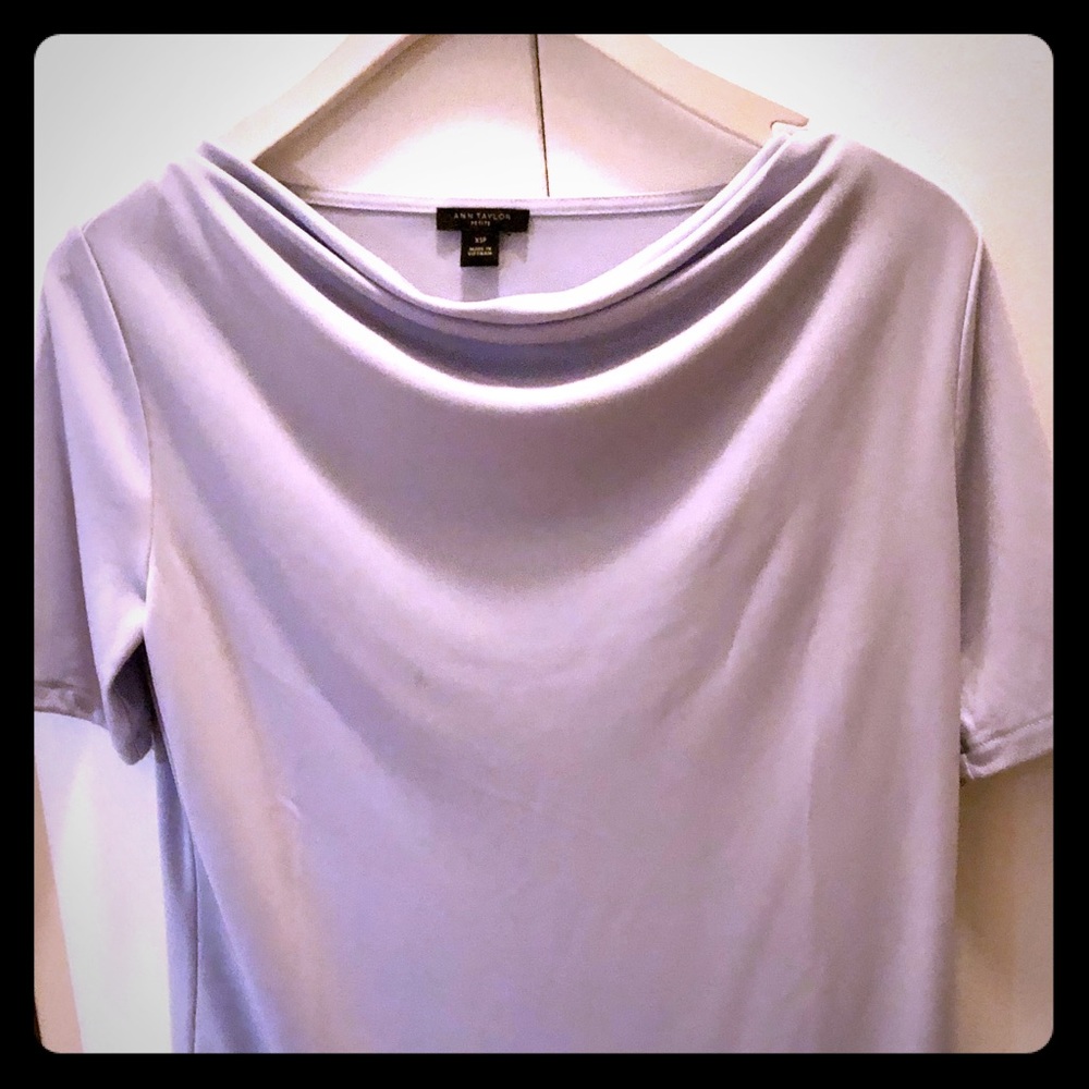 Cowl neck, soft lilac colored short sleeve top.